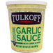 A case of 6 Tulkoff garlic sauce jars on a counter.