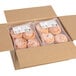 A box of Rich's Fully Finished Glazed Cinnamon Roll Donuts with 4 donuts inside.