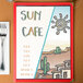 A white menu cover with a Southwest desert design including a sun.