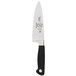 A Mercer Culinary Genesis chef knife with a black handle and blade.