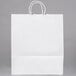 A white Duro paper shopping bag with handles.