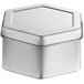 A 2 15/16" x 1 9/16" silver metal container with a hexagon lid.