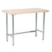 An Advance Tabco wood top work table with a galvanized base.
