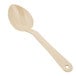 A close-up of a beige Thunder Group salad bar spoon.