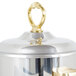 A Vollrath classic brass trim coffee urn with a handle.