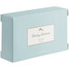 A blue and white Tommy Bahama soap box.
