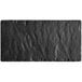 An Acopa black rectangular faux slate melamine serving board with a shiny surface.