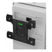 A white and black Kimberly-Clark Professional ICON™ Automatic Soap / Sanitizer Dispenser with a green light.