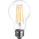 A TCP clear LED filament light bulb glowing yellow.