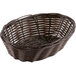 A brown wicker Tablecraft oval bread basket.