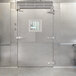 The stainless steel door of a Bally walk-in freezer.