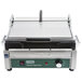 A Waring Panini Supremo sandwich grill with a handle on the lid.