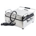 A silver Waring Panini Supremo grill with black handles.