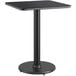 A black rectangular Lancaster Table & Seating table top with a metal base.