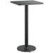A black metal table with a black metal pole.