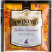 A package of Twinings Golden Caramel Rooibos large leaf pyramid tea sachets with a white label.