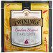 A yellow package of Twinings London Strand Earl Grey large leaf pyramid tea sachets.
