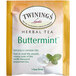 A yellow and white box of Twinings Buttermint Herbal Tea Bags.
