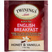 A red and white box of Twinings English Breakfast tea bags.