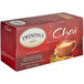 A red box of Twinings Chai Tea Bags with white text and a cup of tea.