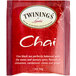 A red box of Twinings Chai Tea Bags with white text.