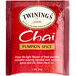 A red box of Twinings Pumpkin Spice Chai Tea Bags with a close-up of a tea bag.