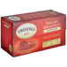 A red and white box of Twinings English Breakfast Decaffeinated Tea Bags.