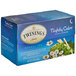 A blue box of Twinings Nightly Calm herbal tea bags.