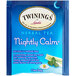 A blue and white box of Twinings Nightly Calm Herbal Tea Bags.