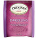 A purple Twinings package of Darjeeling tea bags with white text.