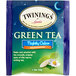 A blue and green Twinings Nightly Calm green decaffeinated tea bag.