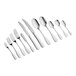 A group of Acopa Triumph stainless steel dinner knives on a white background.