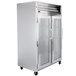 A Traulsen 2 section glass door reach-in refrigerator with left hinged doors.