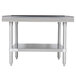 An Advance Tabco stainless steel table with a shelf.