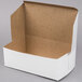 A 10" x 6" x 3 1/2" white cardboard bakery box with a brown lid.
