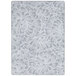 A white rectangular area rug with gray flower patterns.