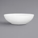 A white Cal-Mil Sedona coupe melamine bowl with a textured pattern.
