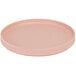 A Cal-Mil blush pink melamine plate with a low rim.