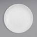 A Cal-Mil Sedona white melamine plate with a textured pattern.
