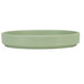 A white melamine plate with a green low rim.