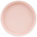 A close-up of a pink Cal-Mil Hudson melamine plate with a low rim.