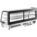 An Avantco black curved refrigerated drop-in countertop bakery display case with a glass door and shelf.