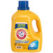 A yellow Arm & Hammer Clean Burst liquid laundry detergent bottle with a blue label.