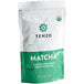 A green and white bag of Tenzo organic ceremonial matcha green tea powder.