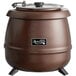 An Avantco copper soup kettle with a lid.