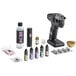 A black Flavour Blaster Pro 2 All-in-One Starter Kit on a counter with different bottles and liquid.
