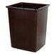 A brown Rubbermaid Glutton trash can with a lid.