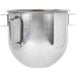 A Globe stainless steel mixing bowl with a handle.