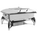 A Tablecraft stainless steel rectangular chafer with a lid on a stand.