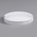 A Tablecraft Crofthouse Collection white round melamine tray with a handle.